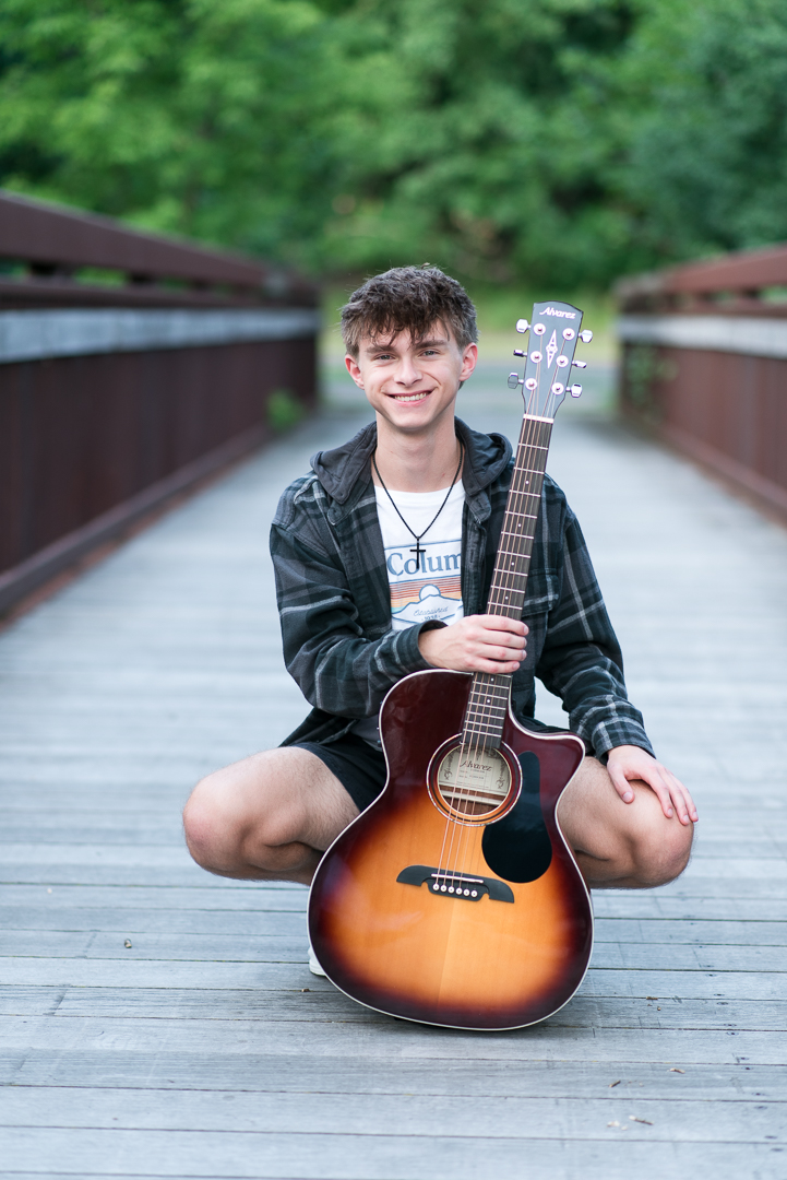 High school senior photography, guy on bridge with guitar, Plymouth MN